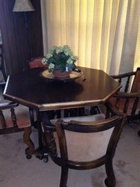 Octagon shaped game table with 4 chairs