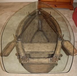 A very unique Glass Top Boat Coffee Table, complete with Paddles, inside view.(63"L x 36"W x 21" H)