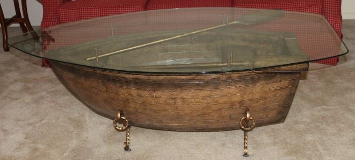 A very unique Glass Top Boat Coffee Table, complete with Paddles. Close up view. (63"L x 36"W x 21" H)