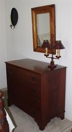Antique  Kapp Joint 4-Drawer  Chest on Bracket Feet C. 1860-1870 (34"H x 40"W x 20"D) shown with an Antique 4.5" Wood Frame Mirror (21.5" x 30.5") and Red Federal Style Vintage 2-Arm Candle Stick Lamp with Medal Shades (side view)