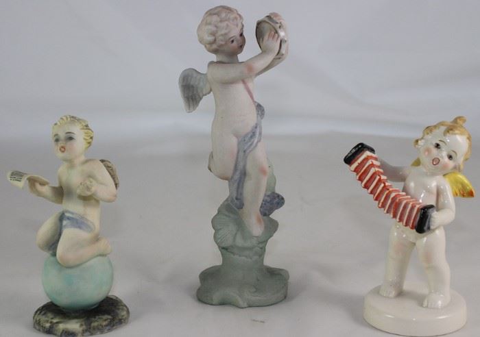 Ardalt Italy Bisque Porcelain Hand Painted Cherub on Ball. Made in Occupied Japan Bisque Porcelain Cherub with Tambourine and Made in Japan Glazed Porcelain Cherub with Accordion Figurines 