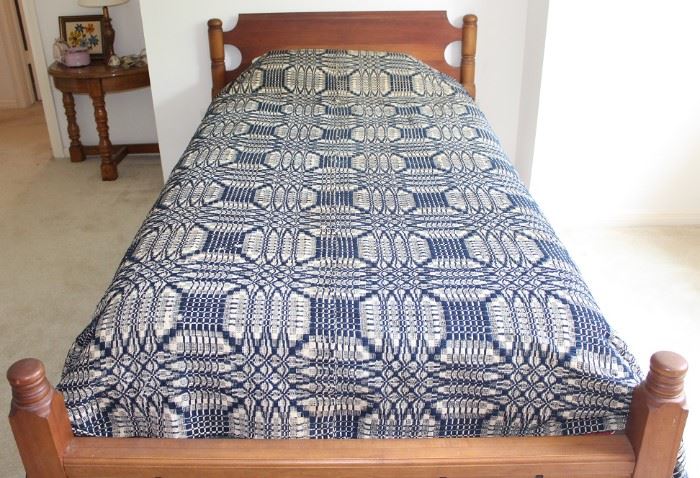 Previous Antique Twin Rope Bed converted to fit a regular mattress set shown with an Antique Linsey Woolsey Coverlet in a Course Linen Warp with Indigo Wool Weft.