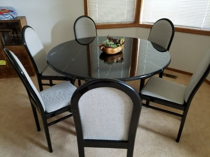 Love this Round Black High Lacquer Dining Table and 6 Chairs. 