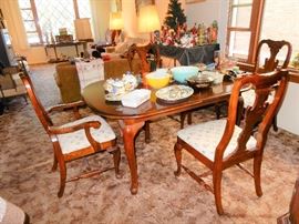 Dining Suite with matching china cabinet and extra table leaf also includes table pads