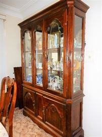 Matching china cabinet with dining table and chair set