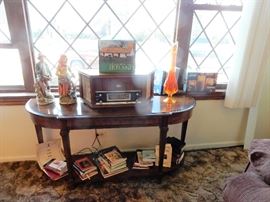 Magnavox Vintage Radio, books and statuary.