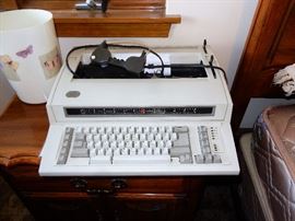 Bedroom # 2, with Blankets, Quilts, Purses, Perfumes, Clothing, Vintage Shoe brushes, IBM Typewriter, TV, 2 Dressers, Night table, FILLED