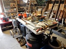 This is a garage for every handyperson, filled with everything imaginable to repair and paint your apartment buildings.