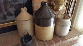 ANTIQUE JUGS AND BUTTER CHURN