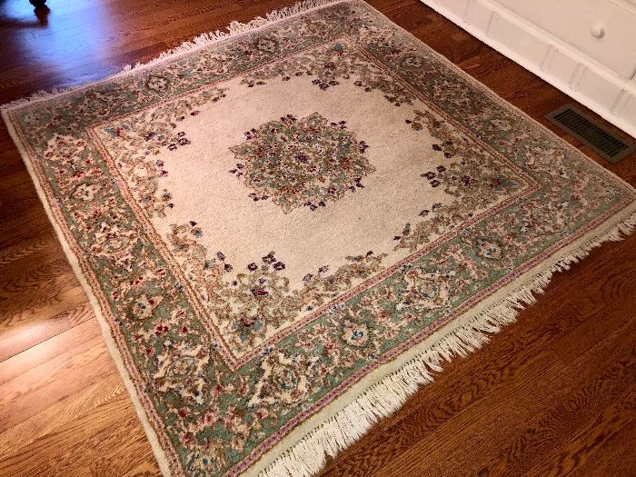We have two square oriental rugs