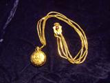 14K gold Elgin Watch with 14k gold watch fob and 14k gold chain. This is a stunning watch.