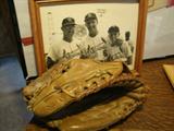 Stan Musial's game used glove from 1963 (the last year he played) is in the auction. Here is a picture of Stan with Vern Benson (the Cardinal's 3rd base coach) and Randy Benson (our seller and the son of Vern Benson). Randy was a scout for the Cardinals for 11 years.