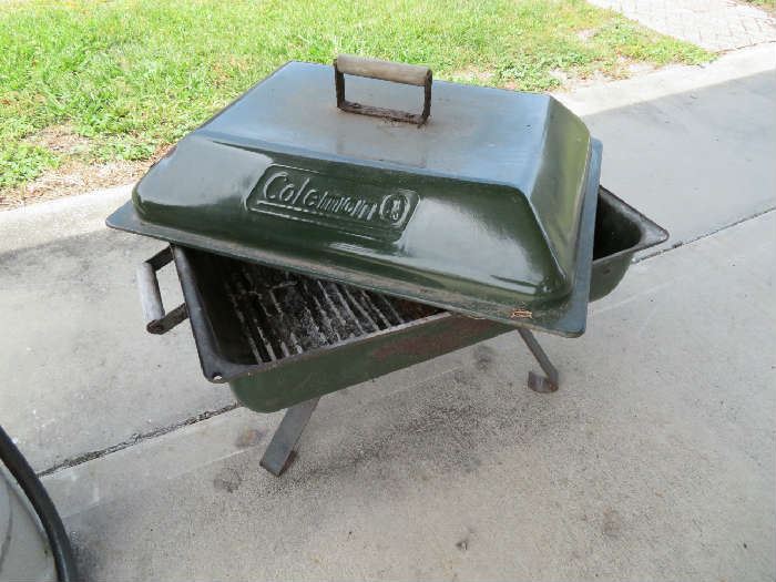 Coleman movable fire pit, has additional stand.