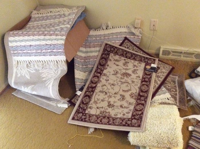 BOXES OF NEW RUGS