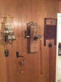 Antique phone and oil lamp wall hanger