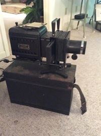 Very old glass slide projector with case and slides