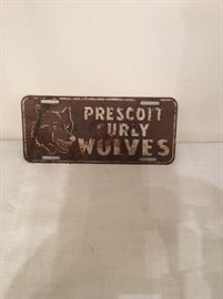 Very old Prescott Curly Wolves license plate
