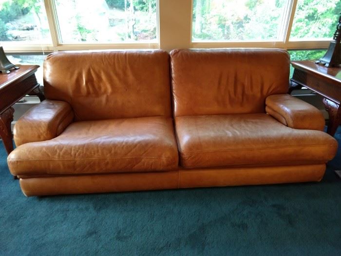 Very nice caramel leather sofa - there's a matching love chair.
