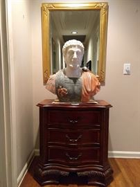 One of several mirrors in the house, reflecting a wonderfully carved marble Marcus Aurelius, atop a banded mahogany 3-drawer chest.