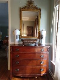 Nice 1940's Drexel mahogany bachelor's chest, with pair of hand painted Chinese porcelain vases, porcelain compote, with bronze mounts and hand carved Italian gilt wood mirror.