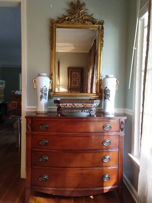 Nice 1940's Drexel mahogany bachelor's chest, with pair of hand painted Chinese porcelain vases, porcelain compote, with bronze mounts and hand carved Italian gilt wood mirror. 