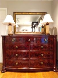 Beautiful 9-drawer Henredon mahogany dresser, pair of blonde marble lamps and yet another gold framed mirror.
