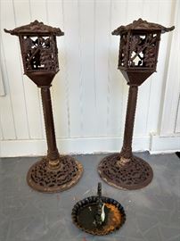 Pair of wrought iron pillar candleholders, vintage cast iron boot scraper.
