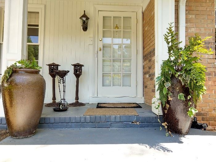 Pair of huge glazed terra cotta olive jars.