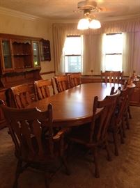 Dining Room Tables w/ 10 solid wood chairs table has 4 leafs