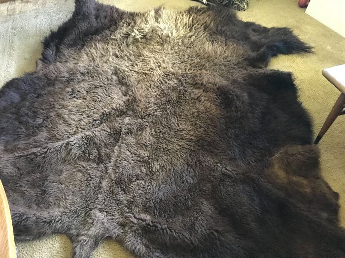 Buffalo Hide- Approximately 78” long by 77” wide give or take an inch or two.