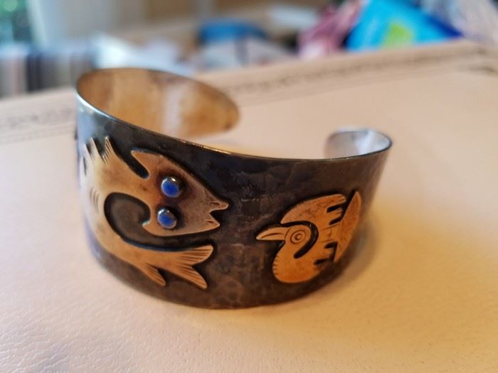 Sterling Silver Bracelet with Stones and 18K Gold onlaid animal figures. Very nice. 