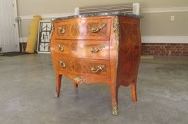 $325.  Small French commode chest with a mixture of  burl walnut , other unique wood designs and marble top.  Originally purchased from Cashion Furniture for $1,200.  It is 31" tall,  32" wide, and 17" deep