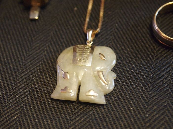 Carved Jade elephant & gold