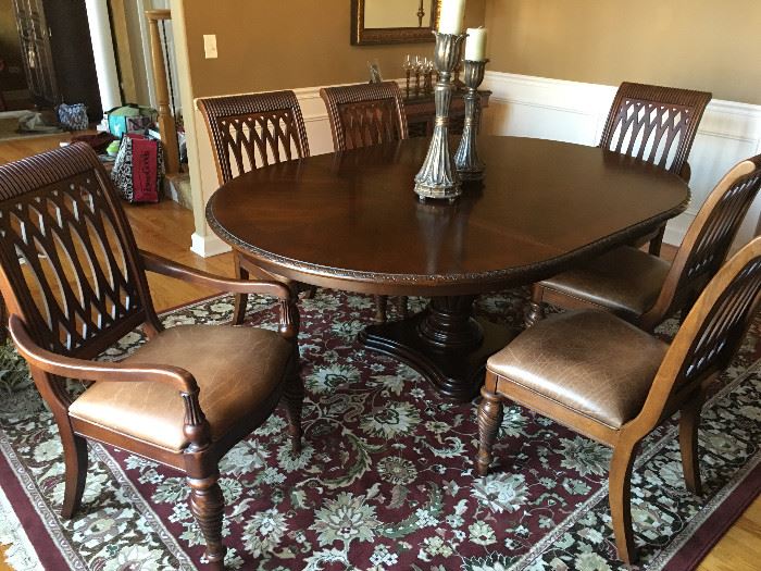 Bernhardt dining table with 2 leaves and 6 chairs. 