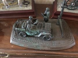 . “CHECKPOINT” is a bronze limited edition sculpture released by Chrysler Corporation in 1988 of the 1941 military Army JEEP