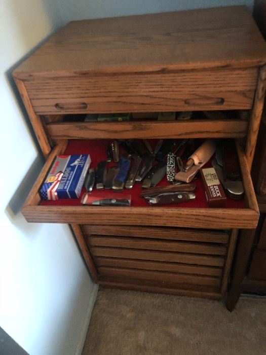 Display cabinet with pocket knife collection 