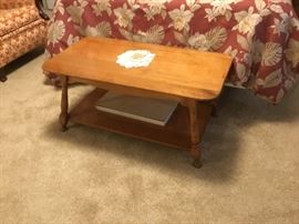 Coffee table with lower shelf