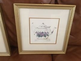 2 matching framed prints