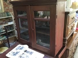 Antique postmaster desk - lift top w/glass front cabinet. Per family, this desk was in the Benton Courier office at one time.