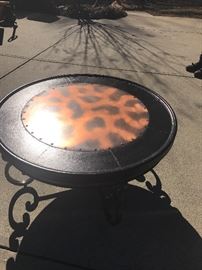 Leather and copper coffee table with iron base.