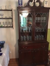 Traditional mahogany China Cabinet brimming with Cape Cod Glassware