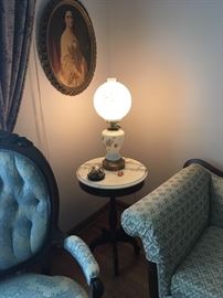 Pair of small mahogany Pedestal Tables with vintage "Oil" Lamps