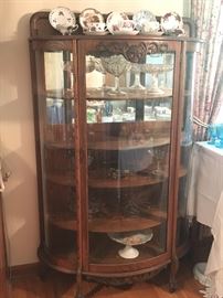 Curved front Oak Cabinet with glass door