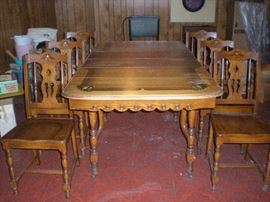 Table is 65"L with two leaves.  Each leaf is 12" w.