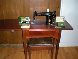 Singer sewing machine 201-2  w/ original cabinet, stool and accessories. .  $275.00