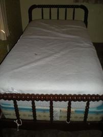 Twin size wood bed frame with mattress and box spring.  $50.00
