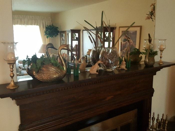 Mantle items - brass swan, brass candlestick holders, more figurines.  Set of fireplace tools.  Stack of real wood in garage for sale.