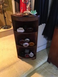 Corner bookcase.   Vintage ashtrays 