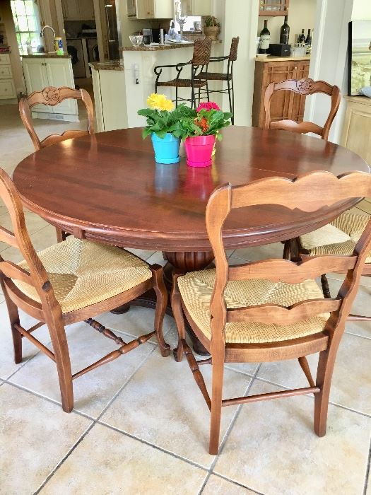 Nichols & Stone pedestal table with one leaf, 6 rush seat chairs made in Italy