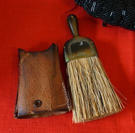 Small horse hair broom with leather sheath